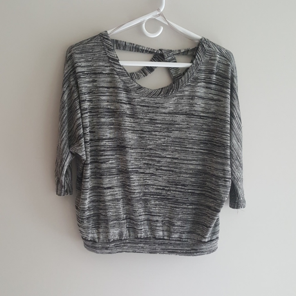Edge. Dolman sleeve top.
